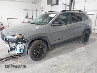 2023 Jeep Cherokee Altitude Lux with VIN 1C4PJMMBXPD115299, listed as a IAAI auction lot 41992492 with 60,232 mi miles. Bid and sale history available at carsss.com. Image 2.