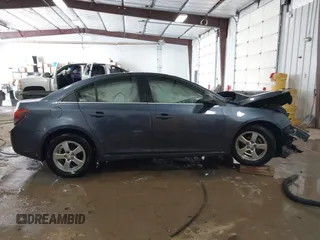 2014 Chevrolet Cruze 1LT with VIN 1G1PC5SB0E7112323, listed as a IAAI auction lot 41571759 with 191,477 mi miles and . Bid and sale history available at DreamBid. Image 14.