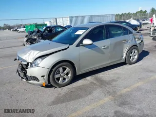 2014 Chevrolet Cruze 1LT with VIN 1G1PD5SBXE7300571, listed as a IAAI auction lot 41571549 with 71,981 mi miles. Bid and sale history available at carsss.com. Image 2.
