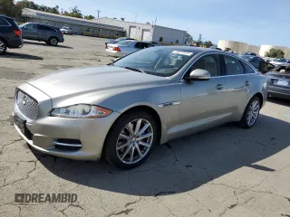 2012 Jaguar XJ with VIN SAJWA1CB0CLV33948, listed as a Copart auction lot 49876915 with 199,975 mi miles and Salvage Title. Bid and sale history available at DreamBid. Image 1.
