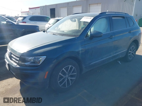 2021 Volkswagen Tiguan SE with VIN 3VV2B7AXXMM089913, listed as a IAAI auction lot 41402158 with 68,158 mi miles and . Bid and sale history available at DreamBid. Image 17.