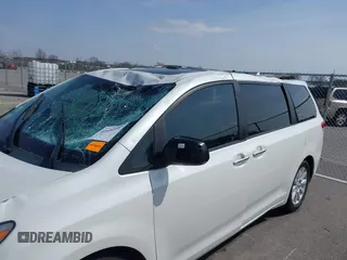 2011 Toyota Sienna XLE AAS with VIN 5TDYK3DC8BS085477, listed as a IAAI auction lot 41934541 with 131,768 mi miles and . Bid and sale history available at DreamBid. Image 6.