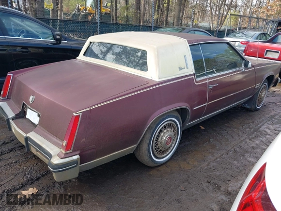 1982 Cadillac Eldorado z VIN 1G6AL578XCE604086, wystawiony jako IAAI lot #41676376 z przebiegiem 102 650 mil mil oraz . Historia ofert i sprzedaży dostępna na DreamBid. Obrazek 4.