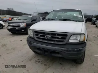 2003 Ford F-150 XL with VIN 1FTRF18W03NA77544, listed as a Copart auction lot 84805894 with Not provided miles and Salvage title. Bid and sale history available at DreamBid. Image 11.