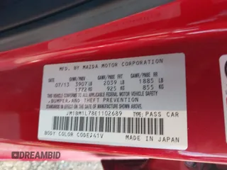 2014 Mazda 3 i Touring with VIN JM1BM1L78E1102689, listed as a IAAI auction lot 42376619 with 65,244 mi miles and . Bid and sale history available at DreamBid. Image 9.