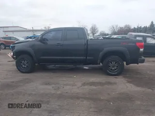 2009 Toyota Tundra 4WD Truck with VIN 5TFBW54119X091419, listed as a IAAI auction lot 41031994 with 214,922 mi miles. Bid and sale history available at carsss.com. Image 14.