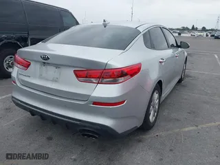 2019 Kia Optima LX with VIN 5XXGT4L3XKG285486, listed as a IAAI auction lot 41872981 with 101,981 mi miles. Bid and sale history available at carsss.com. Image 4.