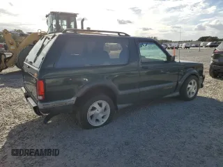 1993 GMC Jimmy z VIN 1GDCT18Z9P0810178, wystawiony jako Copart lot #79442614 z przebiegiem 19 514 mil mil oraz Szkoda całkowita • Salvage title. Historia ofert i sprzedaży dostępna na DreamBid. Obrazek 3.