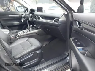 2021 Mazda CX-5 Touring with VIN JM3KFACM6M0480487, listed as a IAAI auction lot 41731646 with 26,951 mi miles and . Bid and sale history available at carsss.com. Image 5.