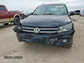 2012 Volkswagen Tiguan SE z VIN WVGAV7AX2CW575871, wystawiony jako Copart lot #58050865 z przebiegiem 96 569 mil mil oraz Szkody całkowita. Historia ofert i sprzedaży dostępna na DreamBid. Obrazek 5.