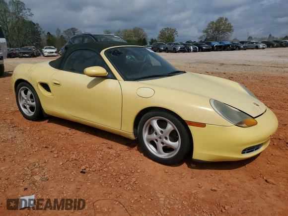 1998 Porsche Boxster с VIN WP0CA2982WU623104, выставлен на аукционе Copart как лот 50941005 с пробегом 78 486 миль миль и Чистый • Clean title. История ставок и продаж доступна на DreamBid. Изображение 4.