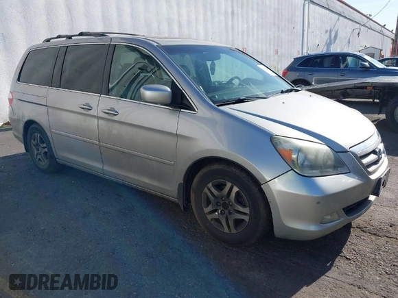 2005 Honda Odyssey TOURING with VIN 5FNRL38855B069043, listed as a IAAI auction lot 42035153 with 236,533 mi miles. Bid and sale history available at carsss.com. Image 1.