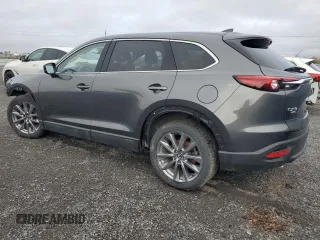 2023 Mazda CX-9 Touring with VIN JM3TCBCY4P0654597, listed as a Copart auction lot 55920855 with 58,534 mi miles and Salvage title. Bid and sale history available at DreamBid. Image 2.
