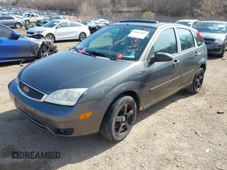 2007 Ford Focus S z VIN 1FAHP37N17W316344, wystawiony jako IAAI lot #41882805 z przebiegiem 262 422 mil mil oraz . Historia ofert i sprzedaży dostępna na DreamBid. Obrazek 2.