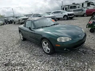 2001 Mazda MX-5 Miata z VIN JM1NB353610200693, wystawiony jako Copart lot #55385725 z przebiegiem 98 777 mil mil oraz Szkoda całkowita • Salvage title. Historia ofert i sprzedaży dostępna na DreamBid. Obrazek 13.