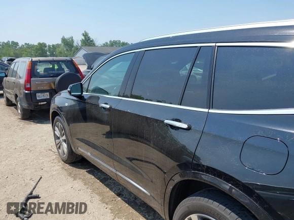 2021 Cadillac XT6 Premium Luxury with VIN 1GYKPDRS0MZ153523, listed as a IAAI auction lot 42770895 with 19,843 mi miles and . Bid and sale history available at DreamBid. Image 14.