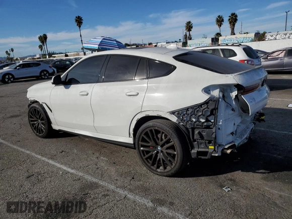 2023 BMW X6 xDrive40i z VIN 5UXCY6C02P9P43834, wystawiony jako Copart lot #85347614 z przebiegiem 16 921 mil mil oraz Szkoda całkowita • Salvage title. Historia ofert i sprzedaży dostępna na DreamBid. Obrazek 2.