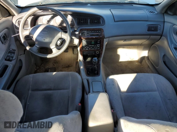 1999 Nissan Altima XE with VIN 1N4DL01D3XC204946, listed as a Copart auction lot 87009404 with 184,731 mi miles and Non Repairable. Bid and sale history available at carsss.com. Image 8.