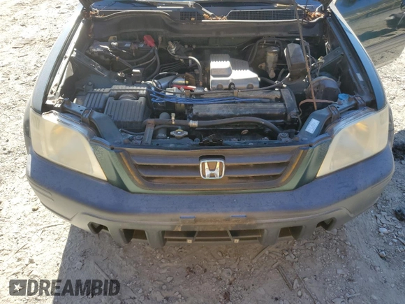 2000 Honda CR-V EX with VIN JHLRD1864YS009698, listed as a Copart auction lot 77073244 with 163,149 mi miles and Clean Title. Bid and sale history available at carsss.com. Image 12.