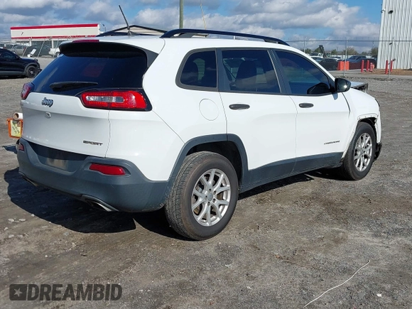 2016 Jeep Cherokee Sport with VIN 1C4PJLAS5GW207990, listed as a IAAI auction lot 41230521 with 253,524 mi miles and . Bid and sale history available at DreamBid. Image 4.