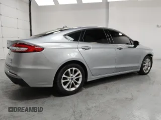 2020 Ford Fusion SE с VIN 3FA6P0HD0LR216857, выставлен на аукционе Copart как лот 60656415 с пробегом 92 016 миль миль и Чистый • Clean title. История ставок и продаж доступна на DreamBid. Изображение 3.