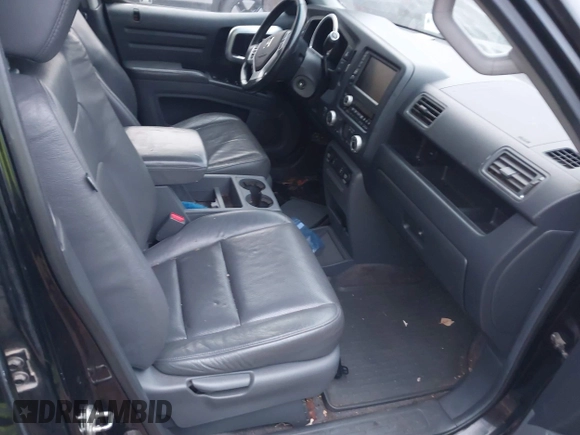 2007 Honda Ridgeline RTL z VIN 2HJYK16527H510681, wystawiony jako IAAI lot #40920924 z przebiegiem Nie podano mil oraz . Historia ofert i sprzedaży dostępna na DreamBid. Obrazek 5.
