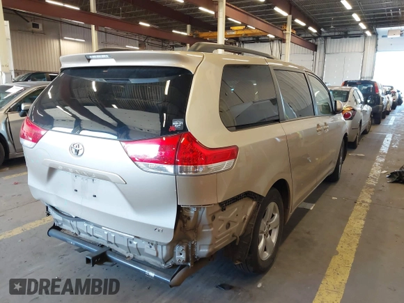 2013 Toyota Sienna LE AAS with VIN 5TDKK3DC8DS359172, listed as a IAAI auction lot 41724930 with 106,488 mi miles. Bid and sale history available at carsss.com. Image 4.