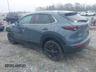 2023 Mazda CX-30 S Carbon Edition with VIN 3MVDMBCM5PM514304, listed as a IAAI auction lot 41795899 with 31,993 mi miles and . Bid and sale history available at DreamBid. Image 3.
