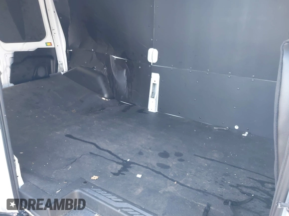 2023 Ford Transit Cargo с VIN 1FTBR2CG4PKB83534, выставлен на аукционе IAAI как лот 41243389 с пробегом 5 507 миль миль и . История ставок и продаж доступна на DreamBid. Изображение 8.