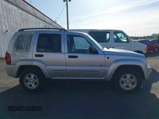 2003 Jeep Liberty Limited z VIN 1J8GL58K73W694818, wystawiony jako IAAI lot #42032227 z przebiegiem 217 446 mil mil oraz . Historia ofert i sprzedaży dostępna na DreamBid. Obrazek 13.