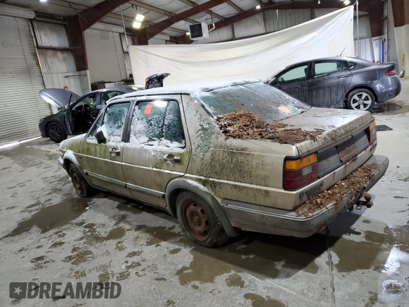 1985 Volkswagen Jetta z VIN WVWGH0166FW548455, wystawiony jako Copart lot #41714155 z przebiegiem Nie podano mil oraz Czysty tytuł • Clean title. Historia ofert i sprzedaży dostępna na DreamBid. Obrazek 2.