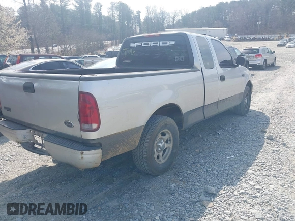 2000 Ford F-150 XL with VIN 1FTZX1724YKA68172, listed as a IAAI auction lot 41788097 with 229,732 mi miles. Bid and sale history available at carsss.com. Image 4.