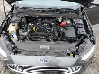 2020 Ford Fusion SE z VIN 3FA6P0HD1LR252332, wystawiony jako Copart lot #58123365 z przebiegiem 76 410 mil mil oraz Szkoda całkowita • Salvage title. Historia ofert i sprzedaży dostępna na DreamBid. Obrazek 11.