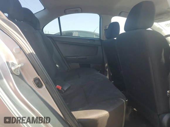 2014 Mitsubishi Lancer SE z VIN JA32V2FW3EU021070, wystawiony jako Copart lot #58239705 z przebiegiem 120 060 mil mil oraz Szkoda całkowita • Salvage title. Historia ofert i sprzedaży dostępna na DreamBid. Obrazek 10.