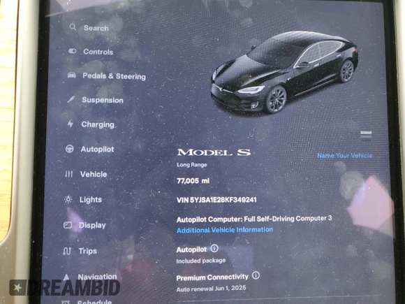 2019 Tesla Model S 75D with VIN 5YJSA1E28KF349241, listed as a Copart auction lot 55279595 with 77,005 mi miles and Salvage title. Bid and sale history available at DreamBid. Image 9.