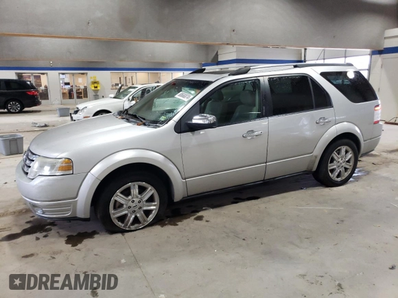 2009 Ford Taurus X Limited with VIN 1FMDK03W59GA01446, listed as a Copart auction lot 80666874 with 135,957 mi miles and Salvage title. Bid and sale history available at DreamBid. Image 1.