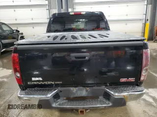 2004 GMC Canyon 1SB SLE Z85 with VIN 1GTDT136348114628, listed as a Copart auction lot 52105615 with 244,232 mi miles and Salvage Title. Bid and sale history available at carsss.com. Image 6.