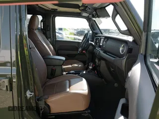 2020 Jeep Wrangler Unlimited Sahara High Altitude with VIN 1C4HJXEG8LW283103, listed as a IAAI auction lot 41830769 with 39,447 mi miles and . Bid and sale history available at DreamBid. Image 5.