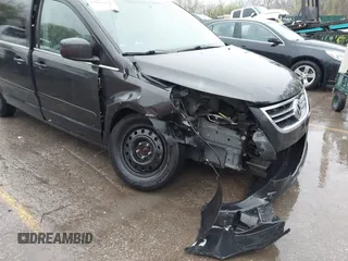 2012 Volkswagen Routan SE z VIN 2C4RVABG0CR193933, wystawiony jako IAAI lot #41962876 z przebiegiem 120 132 mil mil oraz . Historia ofert i sprzedaży dostępna na DreamBid. Obrazek 6.