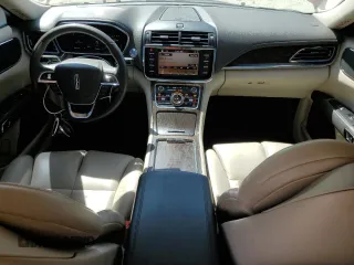 2018 Lincoln Continental Premiere z VIN 1LN6L9PK6J5606061, wystawiony jako Copart lot #50630745 z przebiegiem 59 433 mil mil oraz Szkoda całkowita • Salvage title. Historia ofert i sprzedaży dostępna na DreamBid. Obrazek 8.