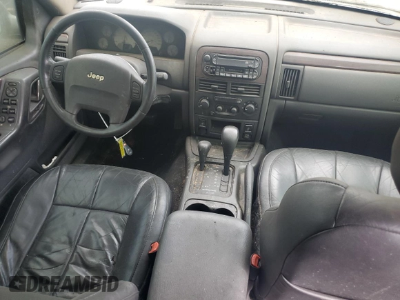 2004 Jeep Grand Cherokee Limited with VIN 1J8GW58J34C363977, listed as a Copart auction lot 61049485 with 162,329 mi miles and Salvage title. Bid and sale history available at DreamBid. Image 8.