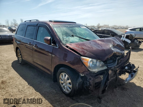 2010 Honda Odyssey EX-L with VIN 5FNRL3H60AB041353, listed as a Copart auction lot 52801315 with 120,253 mi miles and Salvage Title. Bid and sale history available at DreamBid. Image 4.