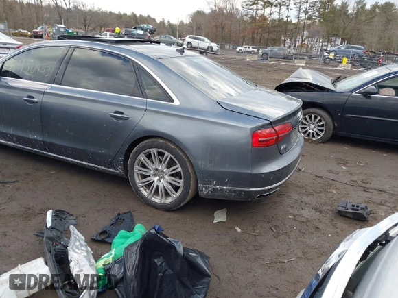 2015 Audi A8 L 4.0T with VIN WAU32AFD4FN041084, listed as a IAAI auction lot 41450453 with 86,199 mi miles. Bid and sale history available at carsss.com. Image 3.
