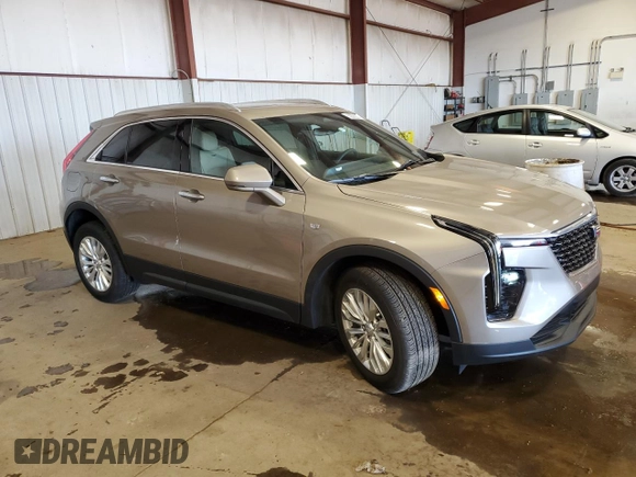 2024 Cadillac XT4 AWD Luxury with VIN 1GYFZBR48RF242850, listed as a Copart auction lot 52290865 with 1,524 mi miles and Salvage Title. Bid and sale history available at carsss.com. Image 4.