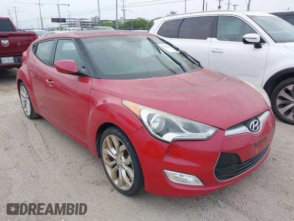 2013 Hyundai Veloster w/Gray Int with VIN KMHTC6AD2DU141462, listed as a IAAI auction lot 42136445 with 122,146 mi miles and . Bid and sale history available at DreamBid. Image 1.