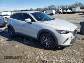 2018 Mazda CX-3 Touring with VIN JM1DKFC71J1305316, listed as a Copart auction lot 88087095 with 68,279 mi miles and Salvage Title. Bid and sale history available at DreamBid. Image 4.