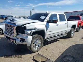 2019 GMC Sierra 2500HD Denali with VIN 1GT12SEY8KF139611, listed as a IAAI auction lot 41641028 with 69,776 mi miles. Bid and sale history available at carsss.com. Image 2.