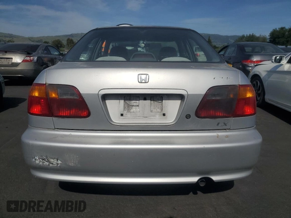 1999 Honda Civic LX z VIN 2HGEJ6675XH562090, wystawiony jako Copart lot #54111445 z przebiegiem 202 417 mil mil oraz Czysty tytuł • Clean title. Historia ofert i sprzedaży dostępna na DreamBid. Obrazek 6.