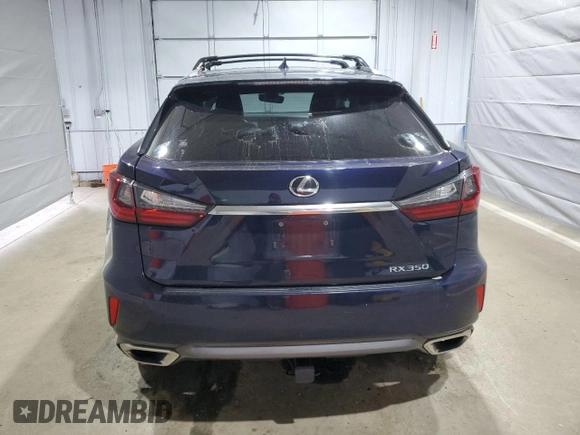 2016 Lexus RX 350 z VIN JTJBZMCAXG2005373, wystawiony jako Copart lot #52017895 z przebiegiem 144 354 mil mil oraz Szkoda całkowita • Salvage title. Historia ofert i sprzedaży dostępna na DreamBid. Obrazek 6.
