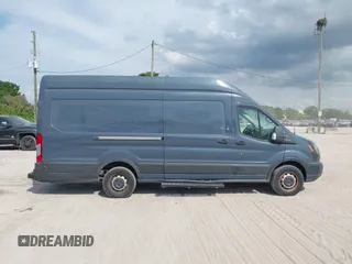 2019 Ford Transit z VIN 1FTYR3XM5KKB13744, wystawiony jako IAAI lot #41768047 z przebiegiem 106 212 mil mil oraz . Historia ofert i sprzedaży dostępna na DreamBid. Obrazek 13.